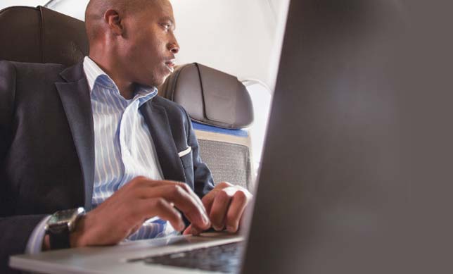 Working on your laptop during the flight is much easier when you are seated in your preferred seat 